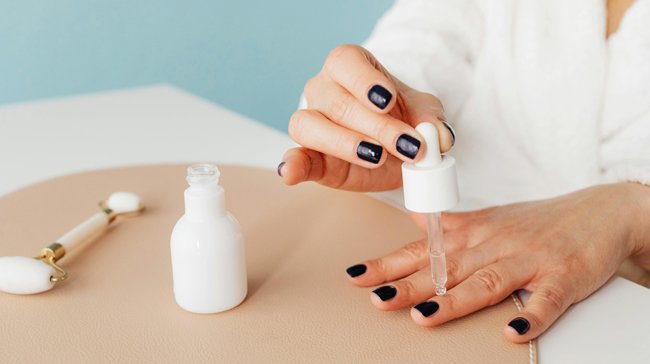 applying oil on nails