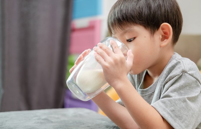 Boy drinking a glass of Milk